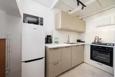 Kuchnia lub aneks kuchenny w obiekcie Żelazna Downtown Apartment by BookingHost