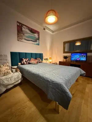 Łóżko lub łóżka w pokoju w obiekcie Scenic View Apartments