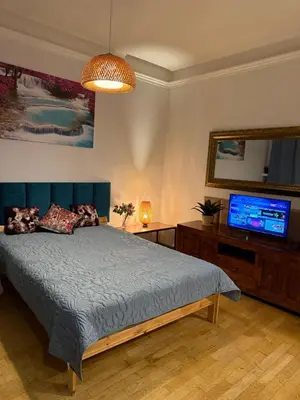 Łóżko lub łóżka w pokoju w obiekcie Scenic View Apartments