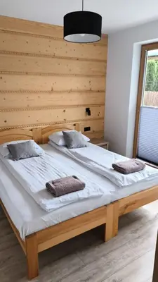 Łóżko lub łóżka w pokoju w obiekcie Cozy Apartment in Warsaw