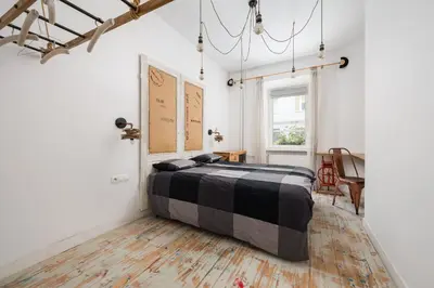 Łóżko lub łóżka w pokoju w obiekcie Apartament na Poznańskiej