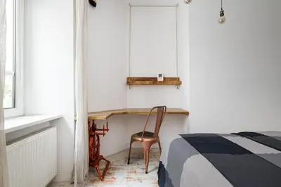 Łóżko lub łóżka w pokoju w obiekcie Apartament na Poznańskiej