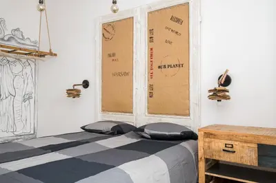 Łóżko lub łóżka w pokoju w obiekcie Apartament na Poznańskiej