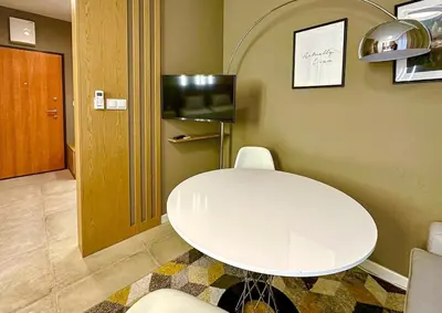 Telewizja i/lub zestaw kina domowego w obiekcie Apartament Wola Jana Kazimierza, WI-FI, Klima, Parking, Balkon, 29m2