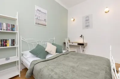 Łóżko lub łóżka w pokoju w obiekcie Stylowy Apartament dla 5 Osób Bartoszewicza by Noclegi Renters