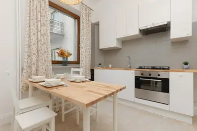 Kuchnia lub aneks kuchenny w obiekcie Stylowy Apartament dla 5 Osób Bartoszewicza by Noclegi Renters