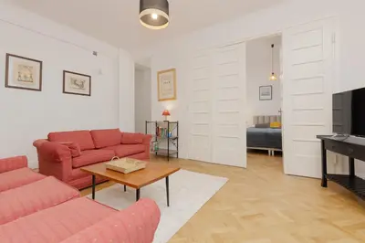 Telewizja i/lub zestaw kina domowego w obiekcie Stylowy Apartament dla 5 Osób Bartoszewicza by Noclegi Renters