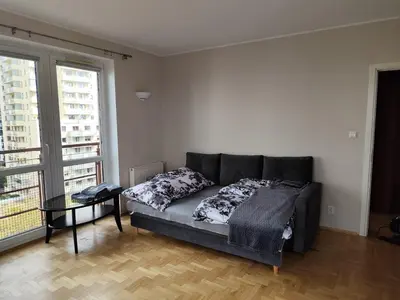 Łóżko lub łóżka w pokoju w obiekcie Bogusławskiego 18
