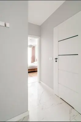 Łóżko lub łóżka w pokoju w obiekcie Luxury & Stylish Apartment in Wola Warsaw, Balcony