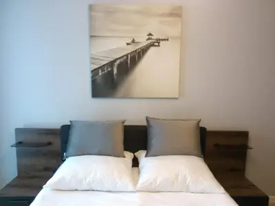 Łóżko lub łóżka w pokoju w obiekcie Luxury & Stylish Apartment in Wola Warsaw, Balcony