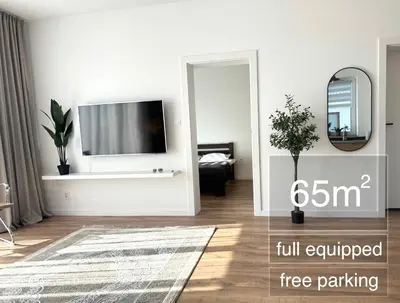Telewizja i/lub zestaw kina domowego w obiekcie TIMELESS Apartment