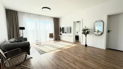Telewizja i/lub zestaw kina domowego w obiekcie TIMELESS Apartment