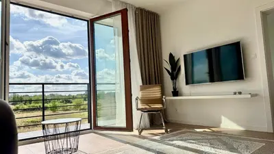 Telewizja i/lub zestaw kina domowego w obiekcie TIMELESS Apartment