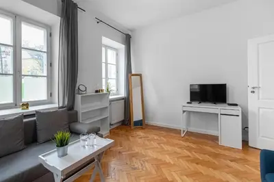 Telewizja i/lub zestaw kina domowego w obiekcie Close-Golden Apartments - Stare Miasto - Cozy and Stylish - Mostowa