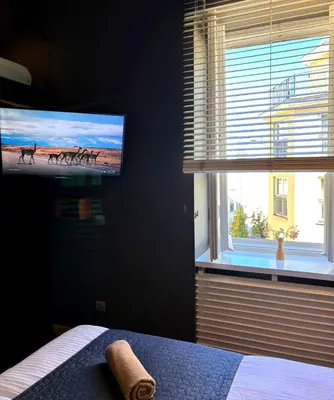 Łóżko lub łóżka w pokoju w obiekcie Loft Apartment Warsaw Centrum lok 4