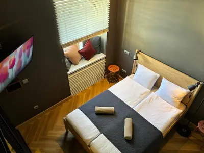 Łóżko lub łóżka w pokoju w obiekcie Loft Apartment Warsaw Centrum lok 4