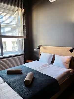 Łóżko lub łóżka w pokoju w obiekcie Loft Apartment Warsaw Centrum lok 4