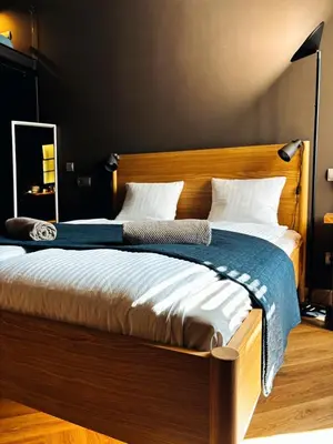 Łóżko lub łóżka w pokoju w obiekcie Apartamenty Loft Nowy Świat Centrum lok 3