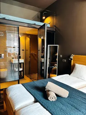Łóżko lub łóżka w pokoju w obiekcie Apartamenty Loft Nowy Świat Centrum lok 3