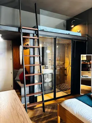 Łóżko lub łóżka w pokoju w obiekcie Apartamenty Loft Nowy Świat Centrum lok 3