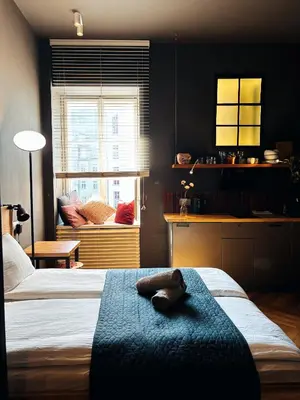 Łóżko lub łóżka w pokoju w obiekcie Apartamenty Loft Nowy Świat Centrum lok 3