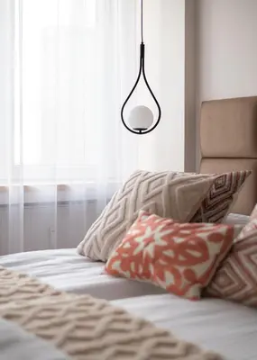 Łóżko lub łóżka w pokoju w obiekcie RentPlanet - Apartament Rondo ONZ