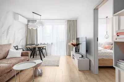 Łóżko lub łóżka w pokoju w obiekcie RentPlanet - Apartament Rondo ONZ
