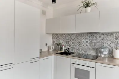 Kuchnia lub aneks kuchenny w obiekcie Sunny city-center apartment - Zielna street