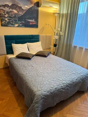 Łóżko lub łóżka w pokoju w obiekcie Scenic Centrum Apartments