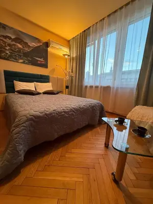 Łóżko lub łóżka w pokoju w obiekcie Scenic Centrum Apartments