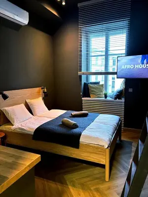 Łóżko lub łóżka w pokoju w obiekcie Loft apartamenty w centrum Warszawy lok 2