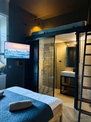 Łóżko lub łóżka w pokoju w obiekcie Loft apartamenty w centrum Warszawy lok 2