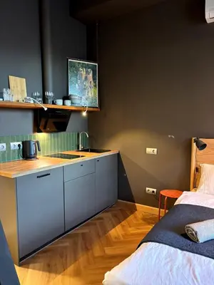 Łóżko lub łóżka w pokoju w obiekcie Loft apartamenty w centrum Warszawy lok 2