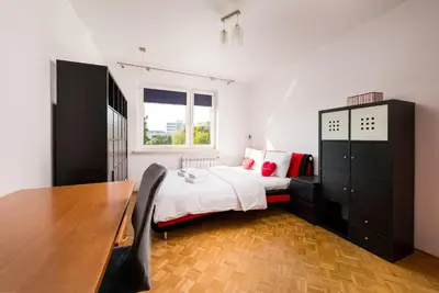 Łóżko lub łóżka w pokoju w obiekcie Park Skaryszewski Homely Apartment by BookingHost