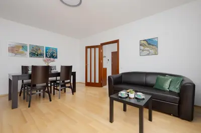 Część wypoczynkowa w obiekcie Wooden Apartment Bellottiego Warsaw with Parking by Noclegi Renters