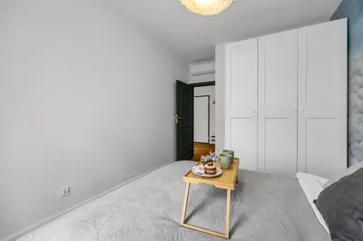 Łóżko lub łóżka w pokoju w obiekcie Praga Apartment - Parking, Terrace - by Rentujemy