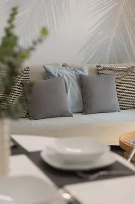 Część wypoczynkowa w obiekcie Modern Apartment with Air Conditioning and Parking Near the PGE Stadium in Warsaw by Noclegi Renters