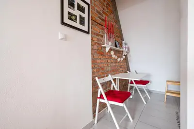Część wypoczynkowa w obiekcie Marymont Apartment with Mezzanine by BookingHost
