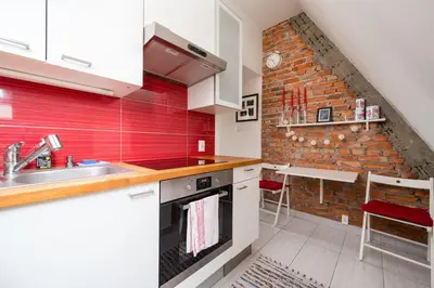 Kuchnia lub aneks kuchenny w obiekcie Marymont Apartment with Mezzanine by BookingHost