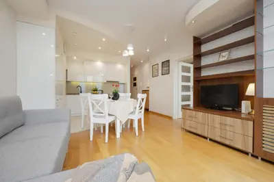 Część wypoczynkowa w obiekcie Beautiful Apartment with Spacious Terrace by Noclegi Renters