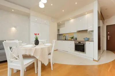 Kuchnia lub aneks kuchenny w obiekcie Beautiful Apartment with Spacious Terrace by Noclegi Renters