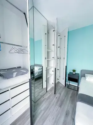 Łóżko lub łóżka w pokoju w obiekcie Chill Spot balcony parking