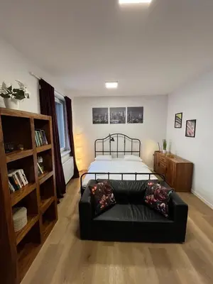 Łóżko lub łóżka w pokoju w obiekcie Ordona Charming Studio II