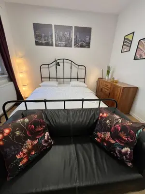 Łóżko lub łóżka w pokoju w obiekcie Ordona Charming Studio II