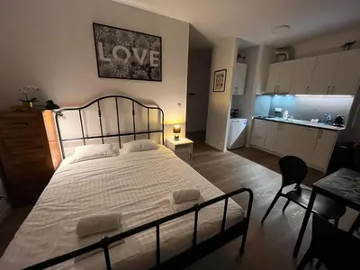 Łóżko lub łóżka w pokoju w obiekcie Ordona Charming Studio III