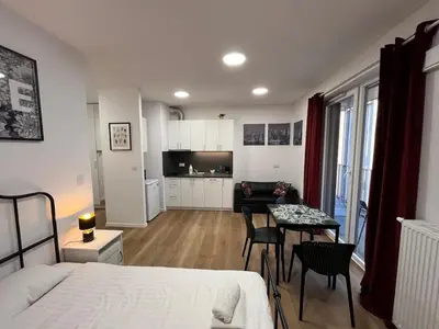 Łóżko lub łóżka w pokoju w obiekcie Ordona Charming Studio III