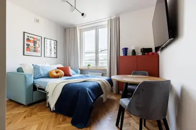 Łóżko lub łóżka w pokoju w obiekcie Kashmir Comfort Apartment