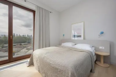 Łóżko lub łóżka w pokoju w obiekcie Port Praski Modern Apartment with AC by Renters Prestige