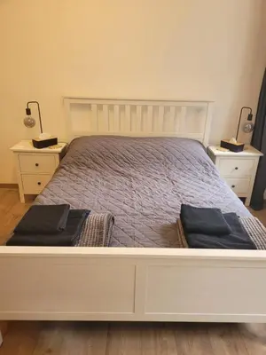 Łóżko lub łóżka w pokoju w obiekcie Studiofreta21