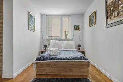 Łóżko lub łóżka w pokoju w obiekcie Kobielska 17 Comfort Living by Solarento